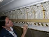 Applying 24k Italian Gold Leaf to egg and dart Plaster Moldings